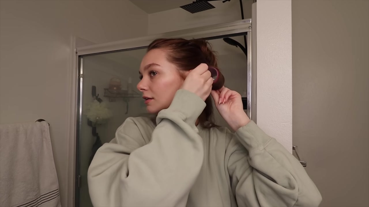 Kayli Boyle demonstrating curve the ends and put in a roller