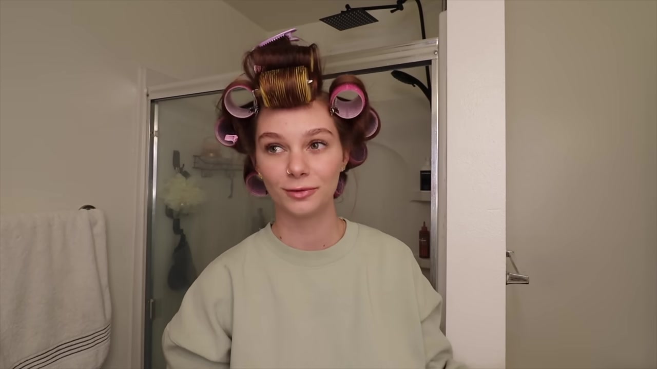 Kayli Boyle demonstrating wait for the hair to cool