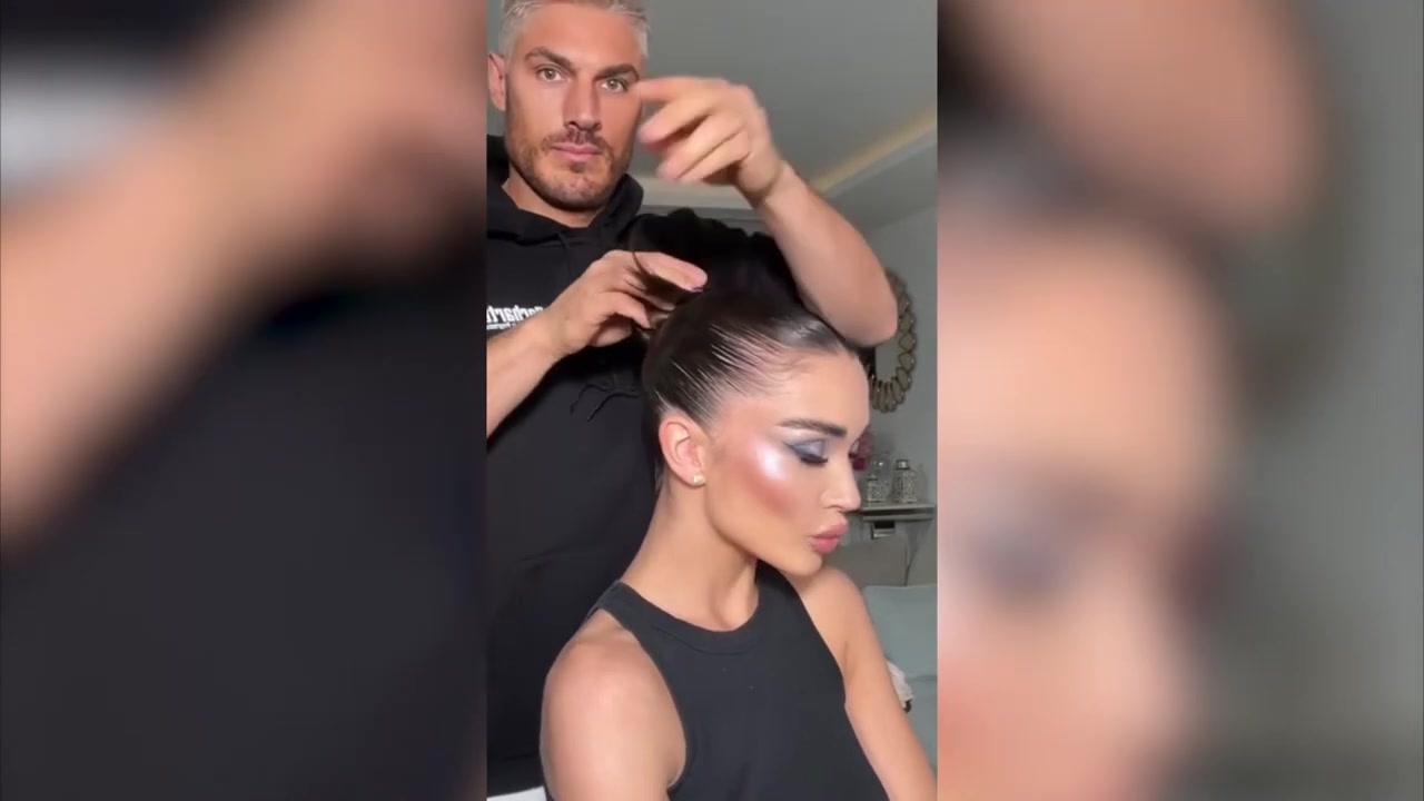 Chris Appleton demonstrating twist and secure the bun