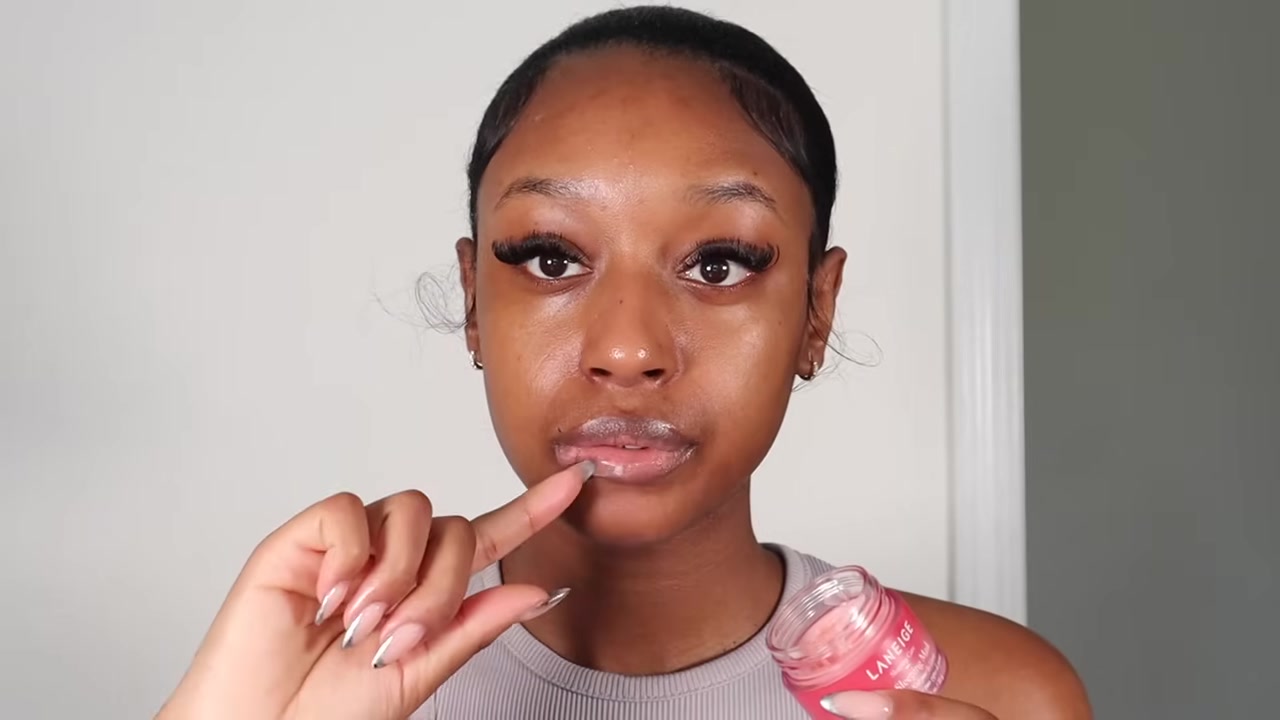 Fatima Bah demonstrating moisturize dry areas and prep the lips