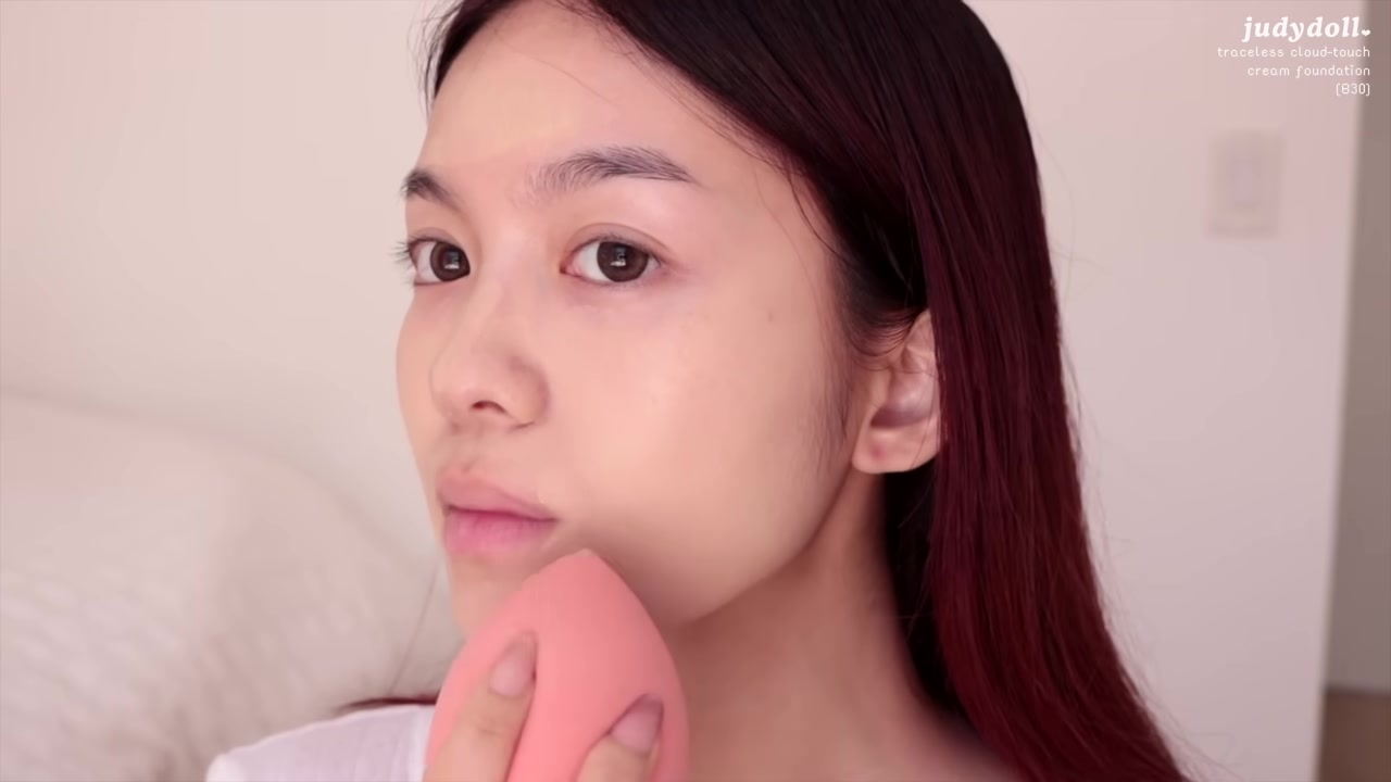 Jessica Vu demonstrating create a thin matte base