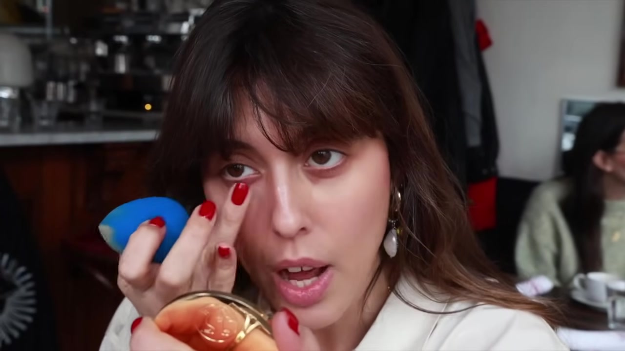 Violette demonstrating place concealer and let it settle briefly