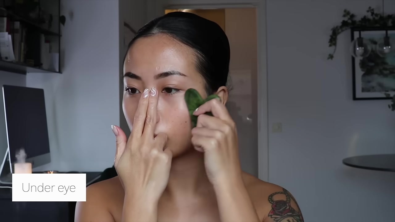 Tina Engeo demonstrating use a lighter touch under the eyes