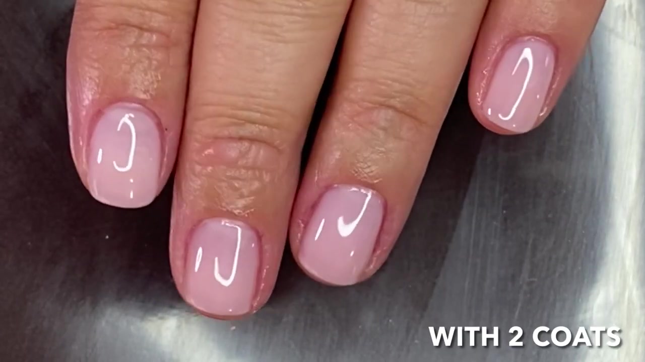 Simple Nail Designs demonstrating apply the sheer pink polish
