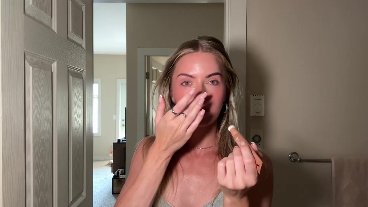 Holly Ward demonstrating build pink cheeks and add highlight