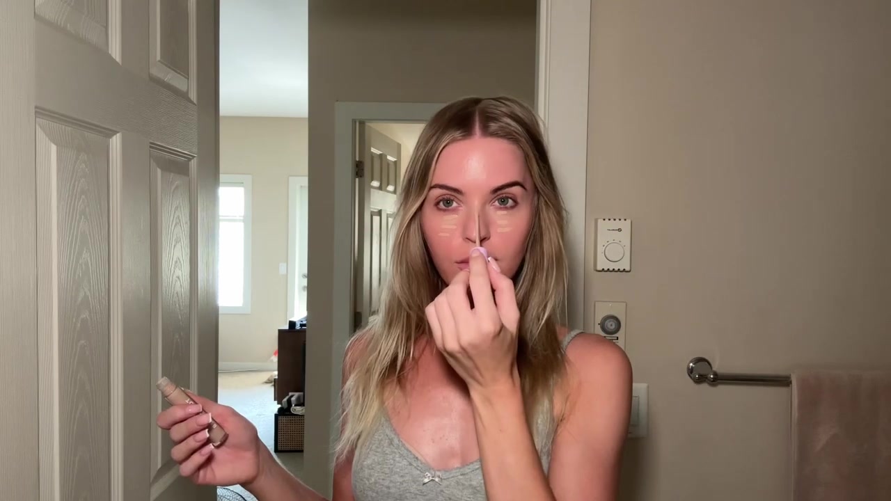 Holly Ward demonstrating apply a light base
