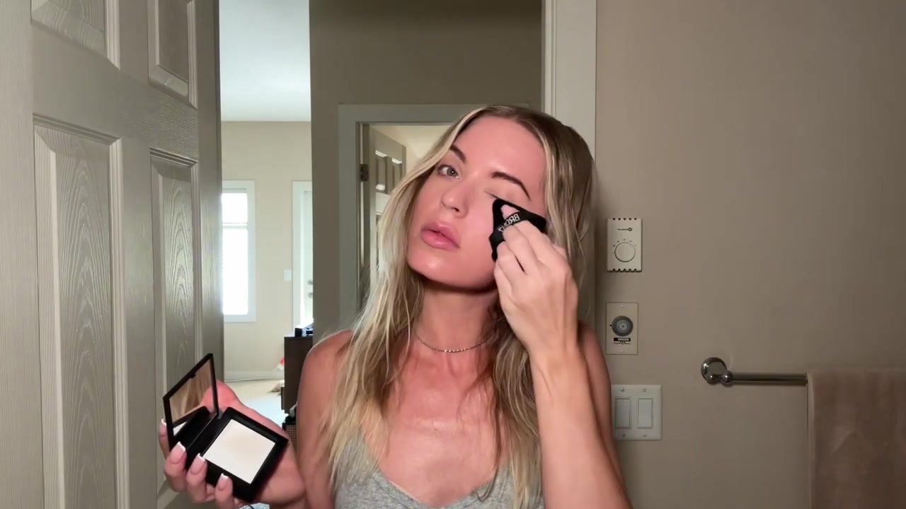 Holly Ward demonstrating apply a light base